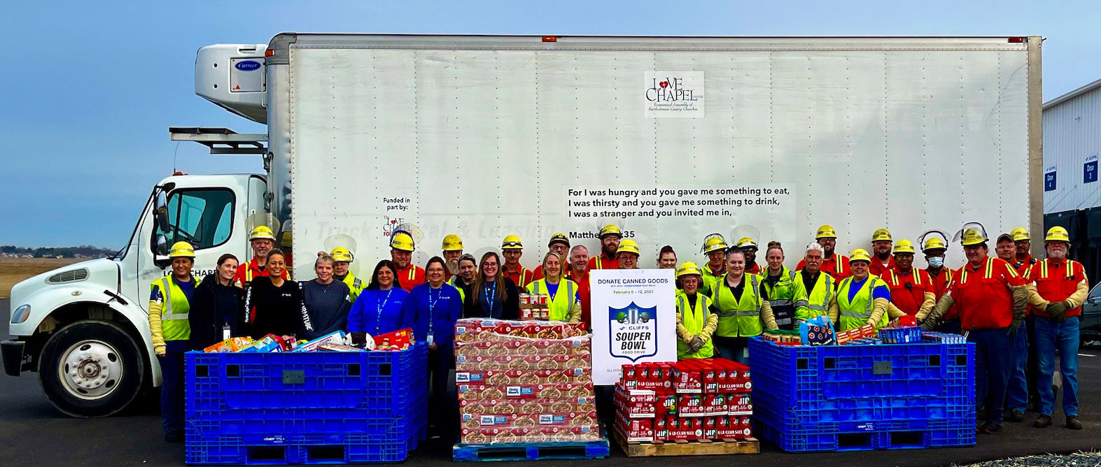 Tubular Components - Columbus employees with food bank donations